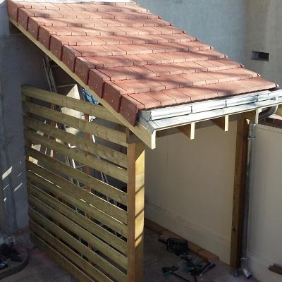 Abri bois sur une terrasse